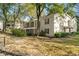 Building exterior with a tree-lined lawn at 1150 Collier Nw Rd # M2, Atlanta, GA 30318