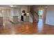 Large kitchen with island and hardwood floors at 1205 Bramlett Creek Pl, Lawrenceville, GA 30045