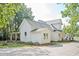 White farmhouse with a wrap-around porch at 234 E Main St, Rutledge, GA 30663