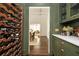 Butlers pantry with green cabinets and marble countertops at 234 E Main St, Rutledge, GA 30663