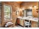 Bathroom with double vanity and large mirror at 7790 Atlanta Newnan Rd, Chattahoochee Hills, GA 30268
