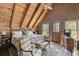 Primary bedroom with wood walls and private access at 7790 Atlanta Newnan Rd, Chattahoochee Hills, GA 30268