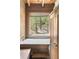 Bathroom with a large garden tub and wood walls at 7790 Atlanta Newnan Rd, Chattahoochee Hills, GA 30268