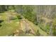 Aerial view of property with fenced pastures at 7790 Atlanta Newnan Rd, Chattahoochee Hills, GA 30268
