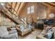 Rustic living room with exposed beams and wood stove at 7790 Atlanta Newnan Rd, Chattahoochee Hills, GA 30268