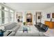 Bright living room with comfortable seating and city views at 2500 Peachtree Nw Rd # 405S, Atlanta, GA 30305