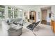 Spacious living room featuring a sectional sofa and large windows at 2500 Peachtree Nw Rd # 405S, Atlanta, GA 30305