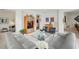 Bright and airy living room featuring a glass coffee table and comfy seating at 2500 Peachtree Nw Rd # 405S, Atlanta, GA 30305