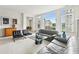 Sun-drenched living room with ample natural light and city views at 2500 Peachtree Nw Rd # 405S, Atlanta, GA 30305