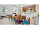 Dining room with a wood table and colorful chairs, great for entertaining at 2500 Peachtree Nw Rd # 405S, Atlanta, GA 30305