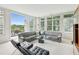Open living room with access to a balcony and city views at 2500 Peachtree Nw Rd # 405S, Atlanta, GA 30305
