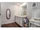 Main bathroom with double vanity and a makeup vanity at 1310 Rogers Trce, Lithonia, GA 30058