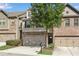 Modern townhome with a two-car garage and attractive landscaping at 4965 Whiteoak Se Walk # 19, Smyrna, GA 30080