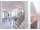 Elegant staircase with wrought iron balusters and light wood treads at 2004 Fontainbleau Dr, Conyers, GA 30094