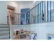 Open staircase overlooking kitchen and dining area at 2004 Fontainbleau Dr, Conyers, GA 30094