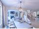 Elegant dining room features a large table and connects to the living room at 2004 Fontainbleau Dr, Conyers, GA 30094