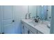 Bathroom with white vanity, black fixtures, and white quartz countertop at 2004 Fontainbleau Dr, Conyers, GA 30094