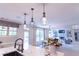 Bright kitchen features white cabinets, quartz countertops, and an open layout at 2004 Fontainbleau Dr, Conyers, GA 30094
