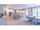 Open concept kitchen with island, stainless steel appliances, and breakfast area at 2004 Fontainbleau Dr, Conyers, GA 30094