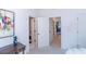 Bright hallway with access to bedrooms and a full bathroom at 2004 Fontainbleau Dr, Conyers, GA 30094