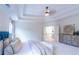 Spacious primary bedroom with sitting area and trey ceiling at 2004 Fontainbleau Dr, Conyers, GA 30094