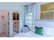 Bright bedroom with ensuite bathroom access and plenty of natural light at 2004 Fontainbleau Dr, Conyers, GA 30094