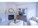 Living room with a marble fireplace and built-in shelving at 2004 Fontainbleau Dr, Conyers, GA 30094