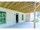 Covered patio with concrete flooring and access to the basement at 2004 Fontainbleau Dr, Conyers, GA 30094