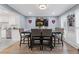 Bright dining room with hardwood floors and a large table at 3636 Evans Rd, Atlanta, GA 30340