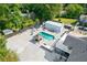 Large backyard with pool, gazebo, and detached garage; aerial view at 3636 Evans Rd, Atlanta, GA 30340