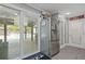 Kitchen with stainless steel refrigerator and view of backyard pool at 3636 Evans Rd, Atlanta, GA 30340