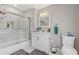 Modern bathroom with a walk-in shower and white vanity at 3636 Evans Rd, Atlanta, GA 30340
