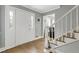 Bright entryway with hardwood floors and staircase at 3636 Evans Rd, Atlanta, GA 30340