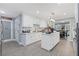 Modern white kitchen with island, stainless steel appliances, and ample counter space at 3636 Evans Rd, Atlanta, GA 30340
