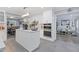 Bright kitchen featuring a center island, double oven, and view into dining area at 3636 Evans Rd, Atlanta, GA 30340