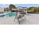 Relaxing pool area with a gazebo and swing at 3636 Evans Rd, Atlanta, GA 30340