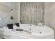 Relaxing bathroom with a large corner jacuzzi tub at 3636 Evans Rd, Atlanta, GA 30340