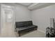 Finished basement with a small sitting area and access to the outdoors at 3636 Evans Rd, Atlanta, GA 30340