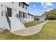 Front exterior of house with walkway and white brick staircase at 3636 Evans Rd, Atlanta, GA 30340