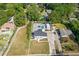 Two-story white house with a large lot, pool, and detached garage at 3636 Evans Rd, Atlanta, GA 30340