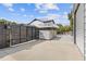 Side yard with modern privacy fence and gate at 3636 Evans Rd, Atlanta, GA 30340