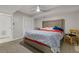 Basement bedroom with a large bed, ceiling fan, and ample closet space at 3636 Evans Rd, Atlanta, GA 30340