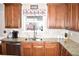 Kitchen with granite countertops and wood cabinets at 3853 Locksley Trl, Douglasville, GA 30135