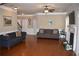 Spacious living room with hardwood floors and a fireplace at 3853 Locksley Trl, Douglasville, GA 30135