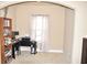 Home office with built-in shelving and a window at 3853 Locksley Trl, Douglasville, GA 30135