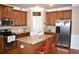 Spacious kitchen with granite countertops and stainless steel appliances at 3853 Locksley Trl, Douglasville, GA 30135