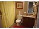 Clean bathroom with granite vanity and a yellow shower curtain at 3853 Locksley Trl, Douglasville, GA 30135