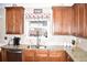 Kitchen with granite countertops and wood cabinets at 3853 Locksley Trl, Douglasville, GA 30135