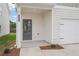 Covered front porch with gray door and white siding at 3028 Viewpark Cir, Conyers, GA 30013