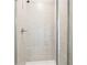 Shower stall with light beige tile and glass enclosure at 3028 Viewpark Cir, Conyers, GA 30013